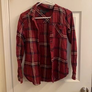 an xs red white and black flannel from tillys